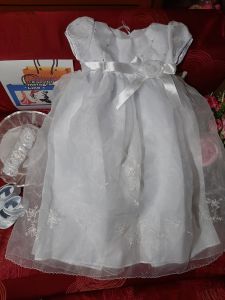 Baptismal gown girl (Combo #4) . This includes a baptismal gown. cap pair of shoes headband and mini rosary crystal beads.
