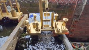 Tiểu cảnh guồng nước mini. Tiểu cảnh hồ cá
