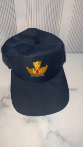 topi biru smp dengan logo tut wuri di bordir