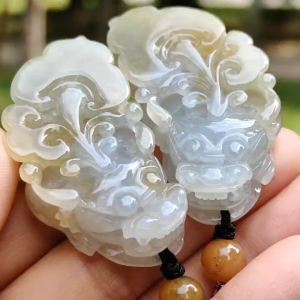 Hight Quality Pair of Yellow with Light Green Hue Natural Type A Jadeite Jade crafted as Pixiu for Pendant certificate weighs 30.53 grams 30.35 grams measurements 50.5 * 26 * 11.5 / 50.5 * 26.2 * 11.5 mm (pendant278)