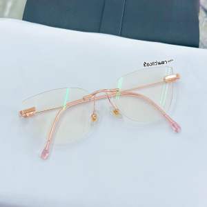 แว่นตาไร้ขอบ+เลนส์AUTO Pink 0900