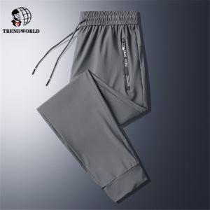 Pantalones de chándal informales para hombre calzas elásticas a la moda talla grande 7XL 8XL color negro y gris Verano