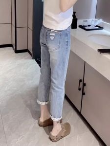 กางเกงยีนส์ทรงตรงเอวสูงสไตล์เกาหลีสำหรับผู้หญิง กางเกงขายาวทรงเดนิมสีอ่อน ลายลูกไม้ ความยาวเก้าฟุต เดรสสั้นฤดูใบไม้ผลิและฤดูร้อนใหม่