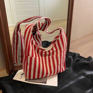 กระเป๋าผ้าใบลายทางสำหรับนักเรียนมัธยมปลาย กระเป๋าถือผู้หญิง ความจุขนาดใหญ่ กระเป๋าสะพายไหล่ข้างเดียว กระเป๋าสาน กระเป๋าผ้าลายทาง กระเป๋าสะพายประจำวัน กระเป๋าผ้าใบ