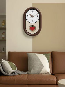 นาฬิกาตั้งผนังแบบไม่ต้องเจาะ นาฬิกาแขวนแบบสเวตเตอร์หรูหรา นาฬิกาตกแต่งห้องนั่งเล่นแบบมีสไตล์และสร้างสรรค์ นาฬิกาแขวนแบบเงียบและไม่รบกวน