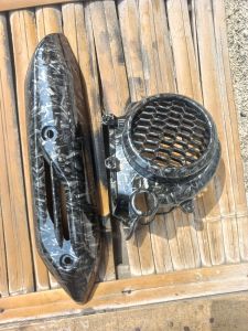 tameng knalpot dan tutup kipas genio karbon forget