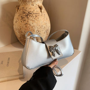 กระเป๋าสะพายข้างผู้หญิงดีไซน์เก๋ไก๋สไตล์ใหม่สำหรับฤดูร้อนปี 2024 กระเป๋าสะพายข้างทรงกลมด้านข้างแบบสะพายข้างพร้อมโบว์ผีเสื้อ