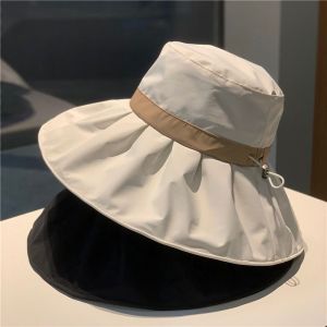 หมวกกันแดดชายหาดทรงกลมสไตล์ลำลองสำหรับผู้หญิงในช่วงฤดูร้อนปี 2025 หมวกตกปลาป้องกันรังสียูวีขนาดใหญ่ หมวกกันแดด หมวกทรงกลม หมวกทรงกลม