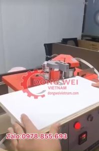 Máy dán cạnh gỗ dw550 dán và cắt khi hết phôi