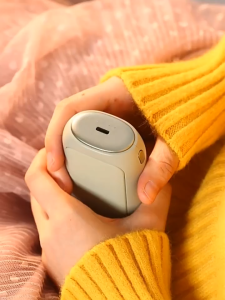 Portable rechargeable hand warmer 2-in-1 large capacity mini double-sided heating portable baby essential constant temperature and lightweight hand warmer.