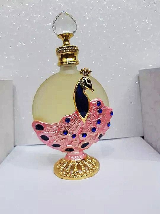 tinh%20d%E1%BA%A7u%20n%C6%B0%E1%BB%9Bc%20hoa%20dubai%20con%20c%C3%B4ng%20l%E1%BB%9Bn%2035ml%20,%20m%E1%BA%ABu%20d%C3%B9ng%20th%E1%BB%AD%20chai%20bi%20l%C4%83n%2010ml%20%20nh%E1%BB%8F%20ng%E1%BB%8Dn%20-%20Image%204