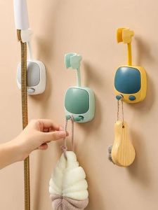 ที่วางฝักบัวในห้องน้ำแบบแขวนผนังไม่ต้องเจาะรูชั้นวางของในห้องน้ำใช้ในบ้านฐานฝักบัวอาบน้ำพลาสติกแบบหมุนได้