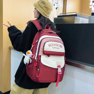 กระเป๋าเป้สะพายหลังผ้าใบลายทางสีพื้นสไตล์วิทยาลัยสำหรับนักเรียนมัธยมปลายและนักเรียนมัธยมต้น ความจุขนาดใหญ่ หลายช่อง กระเป๋าสะพายไหล่คู่สำหรับผู้หญิง