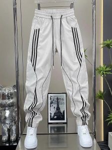 Quần Dài Nam Mùa Hè Mới Kẻ Sọc Dệt Kim Thường Ngày Thời Trang Đa Năng Quần Dài Thể Thao Cạp Chun Quần Dài