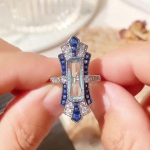 Huitan Silver Color Fashion Women Rings Party Daily Unique Design Finger Accessories Inlaid Shiny Blue CZ Personalized Jewelry