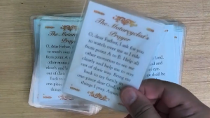 A Drivers Prayer card with gold decorative borders and a steady hand and watchful eye request.