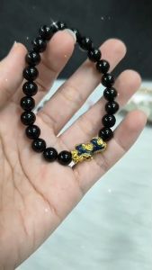 -พราว- สร้อยข้อมือหิน Onyx (โอนิกซ์) หินขนาด 8 มม. + ปี่เซี๊ยะเปลี่ยนสี ขนาด 2 ซม.