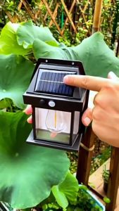 ไฟภายนอกอาคาร LED โซล่าเซลล์ กันน้ำ/กันฝน ไฟติดผนัง 5% แบตทนทาน สีขาว 3โหมด