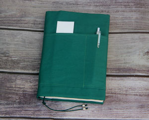 เสื้อกันฝนหนังสือผ้าฝ้ายปรับได้พร้อมกระเป๋า ขนาดต่างๆ พร้อมกระเป๋า ปกหนังสือผ้าฝ้ายแบบอเนกประสงค์ ปกหนังสือแบบอเนกประสงค์