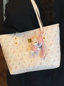 NIkyLundun กระเป๋าถือสไตล์วินเทจพร้อมชาร์มคิ้วท์ เหมาะสำหรับการเดินทางและใช้งานประจำวัน