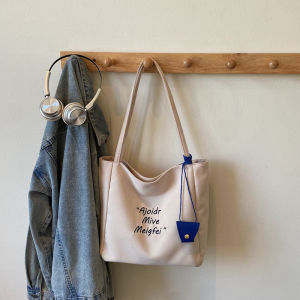 2025 Autumn New Red Canvas Tote Bag Womens Simple Large Capacity Casual Commuting Single Shoulder Bag Trendy