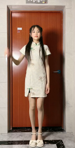 Elegant Floral Cheongsam Dress with Tassel Detail and Mandarin Collar