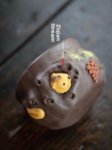 Purple Clay Teacup with Squirrel and Grape Patterns