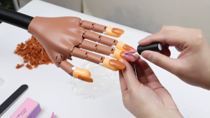 Adjustable Nail Art Hands Professional Practice Hand +Brand-New 100Pcs Nail Tips Nail Decoration Flexible & Soft Practice Model  DIY Manicure Tool Flexible and Adjustable