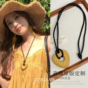Yellow Heart Shaped Long Necklace Womens Design Hollow Large Volcanic Stone Pattern Sweater Chain Accessory Leather Rope