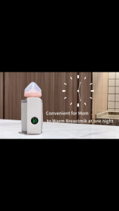 Portable bottle warmer with LED display and multiple temperature settings.Susu lebih panas 溫奶器
