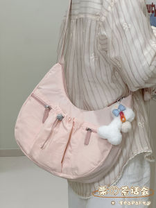 กระเป๋าสะพายข้างทรงขนมจีนแบบลำลองสำหรับผู้หญิง น้ำหนักเบา ความจุขนาดใหญ่ กระเป๋าสะพายข้างแบบสะพายข้างสำหรับนักเรียน กระเป๋าสะพายข้างแบบมีซิป