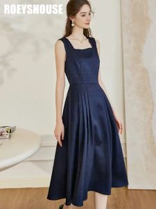 Đầm xanh đen cổ vuông không tay xếp xoè kiểu