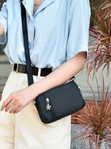 กระเป๋าใส่โทรศัพท์ผ้าแคนวาสแบบยาวสำหรับผู้หญิง กระเป๋าสะพายข้างแบบใหม่ปี 2025 กระเป๋าใส่โทรศัพท์แบบถือได้ กระเป๋าใส่เหรียญขนาดเล็ก