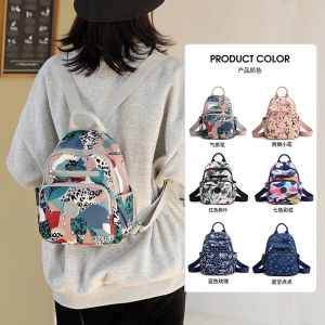 Mini Oxford Cloth Floral Double Shoulder Bag Womens Travel Versatile Canvas Backpack Fashionable New 2025 Commuter Style