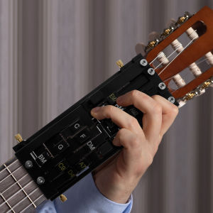 กีตาร์คอร์ด Presserกีตาร์ Aid คอร์ดเทรนเนอร์อุปกรณ์กีตาร์เครื่องสายเครื่องดนตรีกีตาร์เครื่องมือการเรียนรู้