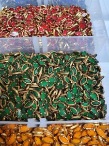 Gold border kundan in various shapes and colors.