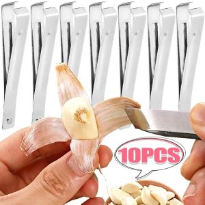 ที่หนีบกระเทียมปอกแบบใช้มือสแตนเลสสตีล10ชิ้นอุปกรณ์ปอกผักถั่วด้วยมือที่คีบสำหรับใช้ในครัวอเนกประสงค์