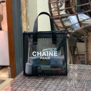 กระเป๋าถือผ้าตาข่ายลายตัวอักษรสไตล์เกาหลี ความจุขนาดใหญ่ ระบายอากาศได้ดี กระเป๋าใส่เครื่องสำอาง กระเป๋าสำหรับใช้ในชีวิตประจำวัน กระเป๋าถือ PVC ขนาดกลาง