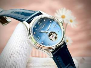 ĐỒNG HỒ NỮ CHÍNH HÃNG Citizen PR1041-18N Automatic Open Heart Blue Dial Sapphire Black Leather For Women