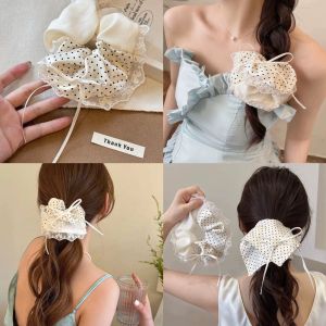 ผ้าพันคอผู้หญิง ผูกผมโบว์ผีเสื้อลายจุด รุ่นใหม่ปี 2025 สัมผัสหรูหรา สไตล์เกาหลี ผ้าพันคอผูกผมแบบสี่เหลี่ยม ยางยืดสำหรับผูกผม