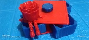 3D Printed Jewelry Rotation Box with Red Rose and Blue Hexagon Top for Elegant Storage