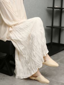 Imoko กระโปรงจับจีบสีครีมลุคนางฟ้าสำหรับฤดูใบไม้ผลิและฤดูร้อนกระโปรงยาวปานกลางทรง A ดูผอมเอวยางยืดทรงหลวมเอวสูงสำหรับผู้หญิง