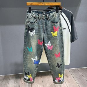 กางเกงยีนส์ทรงตรงพิมพ์ลายผีเสื้อไซส์ใหญ่ ทรงหลวม กางเกงขายาวลำลองสำหรับฤดูใบไม้ร่วงและฤดูใบไม้ผลิ สำหรับผู้ชายและผู้หญิง