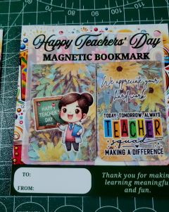 Two Magnetic Bookmarks for World Teachers Day Vibrant Print in Thick Photopaper with Glitter Laminated Photo Top 6 x 4 cm size if folded