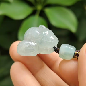High Quality Light Green Hue with Green Patches Natural Type A Jadeite Jade crafted as Squirrel as Pendant certificate weighs 11.1 grams measurement 22.7 * 22.8 * 14 mm (pendant298)