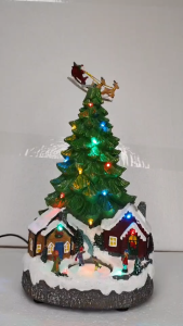 ONELINE #FC622 polyresin animated Christmas village scene features a tree at the base and a flying Santa sleigh on top