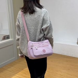 Túi giỏ xách đeo chéo đeo vai nữ thời trang size 29cm với 11 ngăn chất liệu vải dù chống nước chống xước cao cấp TX085