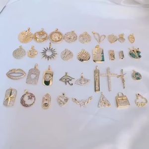 Juya New Design 18K Real Gold Plated Smile Face Greek Evil Eye Cross Saint Mary Bear Tiger Charms For DIY Pendant Jewelry Making
