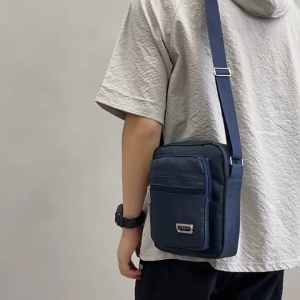 SEA YADOU กระเป๋าผู้ชายแบบใหม่กระเป๋าสะพายแนวตั้งกระเป๋าเป้สะพายหลังขนาดเล็กผ้าอ๊อกฟอร์ดกันน้ำและทนต่อการสึกหรอกระเป๋าหลายกระเป๋ากระเป๋าสตางค์ผู้ชายทำธุรกิจ