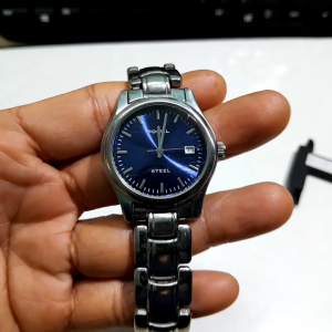 Đồng hồ nam thép đúc STELL có lịch size 36mm mặt xanh -đã qua sử dụng.
